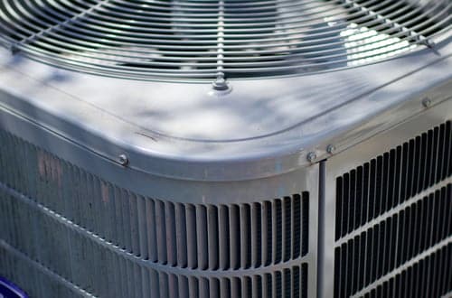 MDB Same Day HVAC Inc servicing a residential air conditioning condenser unit